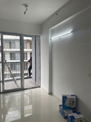 Living Room in 2 BHK Apartment at 3C Lotus Zing, Sector 168 – for Sale