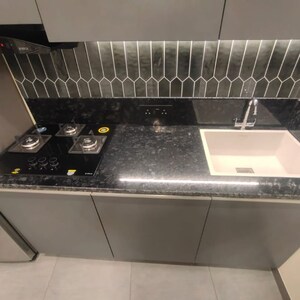 Kitchen in 3 BHK Apartment at Mahagun Mirabella, Sector 79 – for Sale