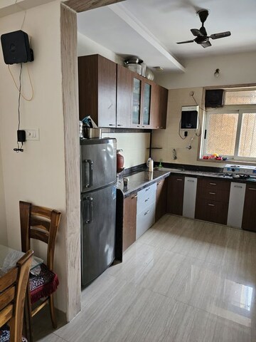 Kitchen in 2 BHK Apartment at Pride Presidency Luxuria, Ghodbunder Road – for Sale