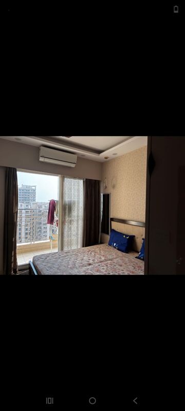 Bedroom in 2.5 BHK Apartment at Mahagun Marvella, Sector 78 – for Rent
