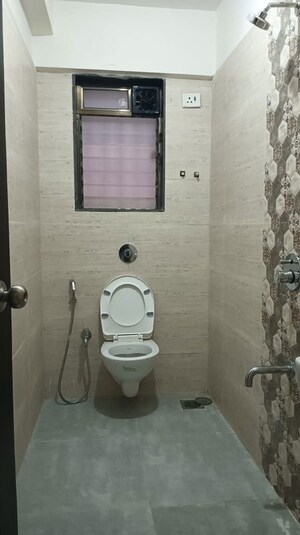 Bathroom in 2 BHK Apartment at Navkar Sakshat Navkar, Borivali West – for Sale