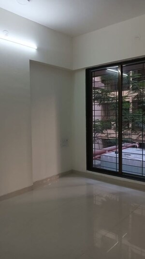 Room in 2 BHK Apartment at Navkar Sakshat Navkar, Borivali West – for Sale