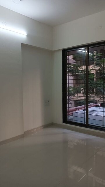 Room in 2 BHK Apartment at Navkar Sakshat Navkar, Borivali West – for Sale