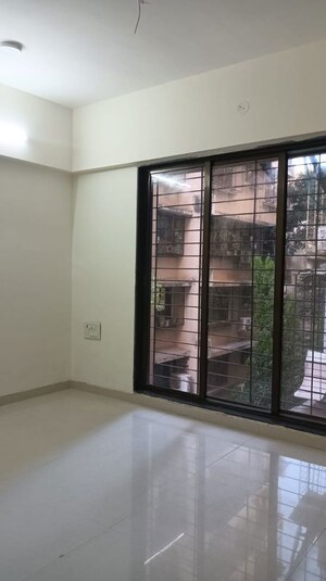 Room in 2 BHK Apartment at Navkar Sakshat Navkar, Borivali West – for Sale