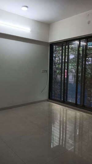 Room in 2 BHK Apartment at Navkar Sakshat Navkar, Borivali West – for Sale