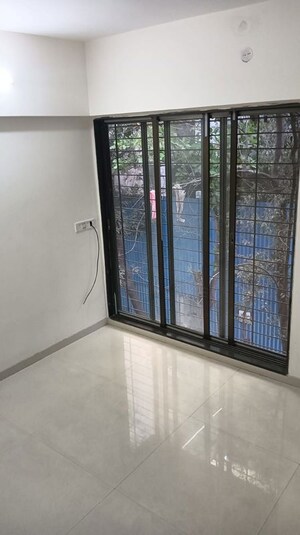 Room in 2 BHK Apartment at Navkar Sakshat Navkar, Borivali West – for Sale