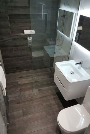 Bathroom in 2 BHK Apartment at Raheja Acropolis, Deonar – for Rent