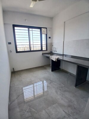 Kitchen in 1 BHK Apartment at Unique Youtopia, Kharadi – for Rent