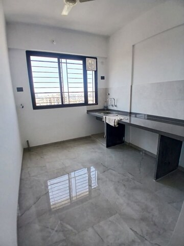 Kitchen in 1 BHK Apartment at Unique Youtopia, Kharadi – for Rent