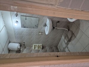 Bathroom in 3 BHK Apartment at Antriksh Golf View, Sector 78 – for Rent