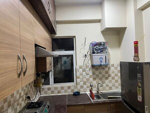 Kitchen in 2 BHK Apartment at Gaur City 2 - 10th Avenue, Sector 16c Greater Noida – for Rent