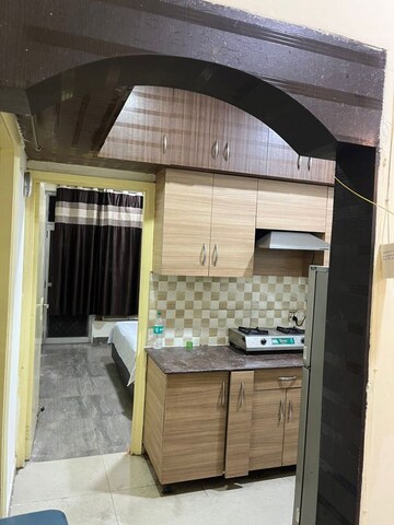 Kitchen in 2 BHK Apartment at Gaur City 2 - 10th Avenue, Sector 16c Greater Noida – for Rent