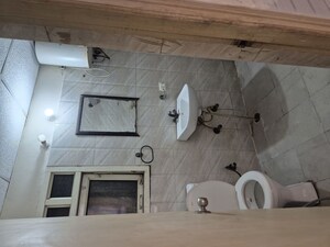 Bathroom in 3 BHK Apartment at Antriksh Golf View, Sector 78 – for Rent