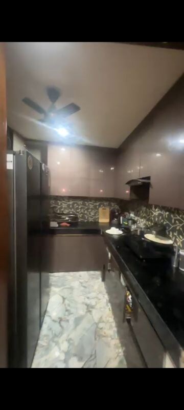 Kitchen in 3 BHK Apartment at Vishwakarma Colony – for Sale