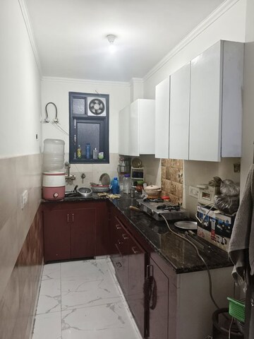 Kitchen in 3 BHK Apartment at Vishwakarma Colony – for Sale