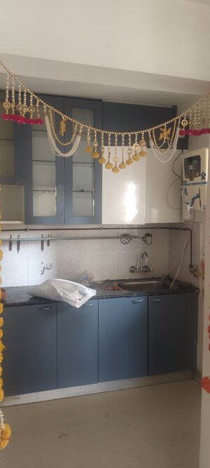 Kitchen in 2 BHK Apartment at Hawelia Valencia Homes, Sector 1 Greater Noida – for Sale