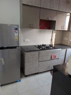 Kitchen in 1 BHK Apartment at Hiranandani Lavinia, Ghodbunder Road – for Rent