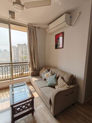 Living Room in 1 BHK Apartment at Hiranandani Lavinia, Ghodbunder Road – for Rent