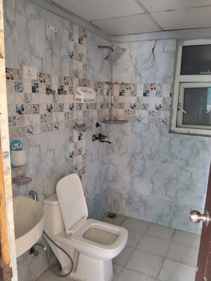 Bathroom in 2.5 BHK Apartment at Aims Golf City, Sector 75 – for Rent