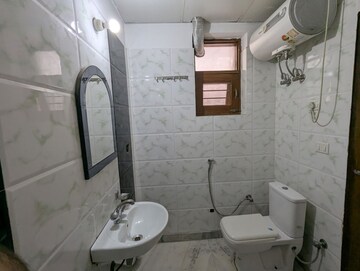 Bathroom in 3 BHK Builder Floor at RWA Residential Society Sector 46, Sector 46 – for Rent