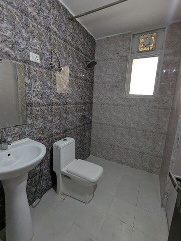 Bathroom in 3 BHK Apartment at Mahagun Moderne, Sector 78 – for Rent