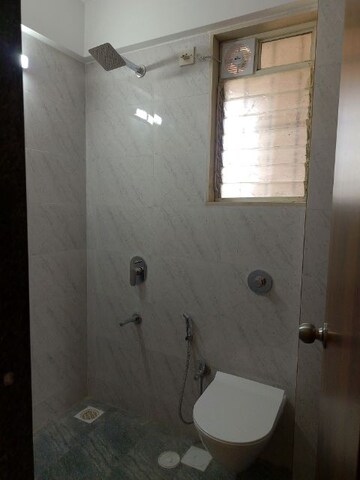 Bathroom in 3 BHK Apartment at Dosti Blossom, Wadala East – for Rent