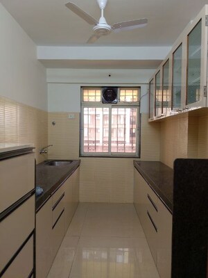 Kitchen in 3 BHK Apartment at Dosti Blossom, Wadala East – for Rent