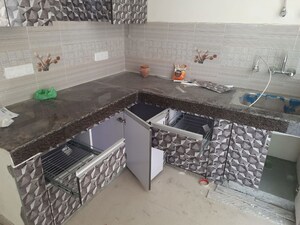 Kitchen in 2 BHK Apartment at Proview Officer City 2, Raj Nagar Extension – for Sale