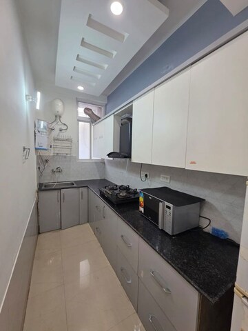 Kitchen in 2 BHK Builder Floor at RK Qutab Heights, Dlf Phase iv – for Rent