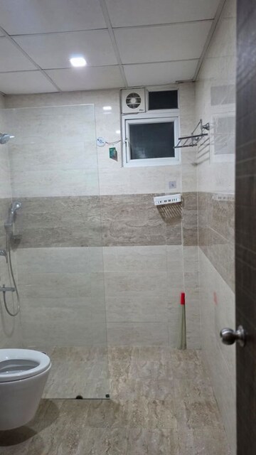 Bathroom in 4 BHK Apartment at Ansal Celebrity Meadows, Sushant Golf City – for Rent