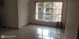 Living Room in 2 BHK Apartment at Romell Diva, Malad West – for Sale
