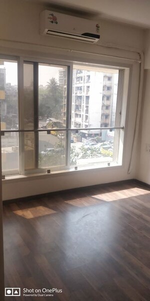 Master Bedroom in 2 BHK Apartment at Romell Diva, Malad West – for Sale