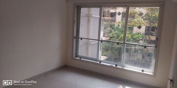 Room in 2 BHK Apartment at Romell Diva, Malad West – for Sale