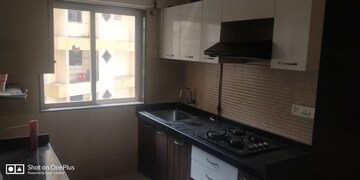 Kitchen in 2 BHK Apartment at Romell Diva, Malad West – for Sale