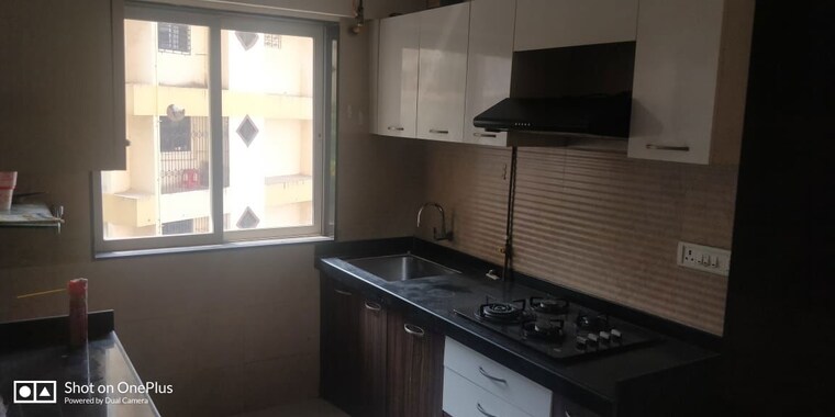 Kitchen, romell-diva 2 Bedroom 740 Sq.Ft. Apartment In Malad West Mumbai 10050631