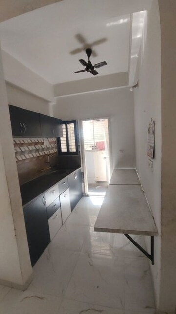 Kitchen in 2 BHK Apartment at Saffron Binory Residency, Satellite – for Rent