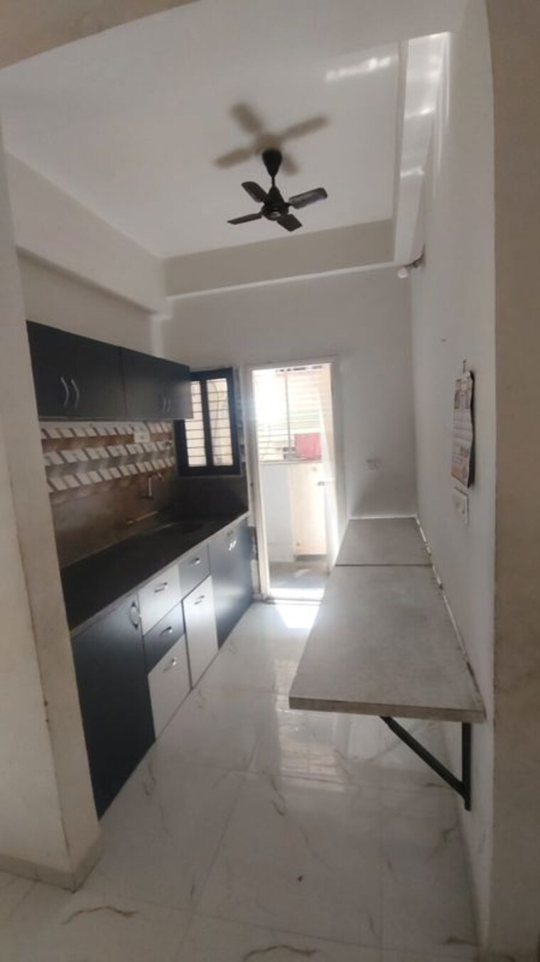 Kitchen, saffron-binory-residency 2 Bedroom 531 Sq.Ft. Apartment In Satellite Ahmedabad 10050759
