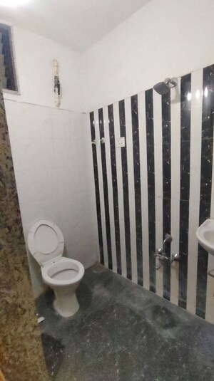 Bathroom in 2 BHK Apartment at Saffron Binory Residency, Satellite – for Rent