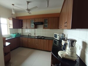 Kitchen in 3.5 BHK Apartment at 3C Lotus Boulevard, Sector 100 – for Rent