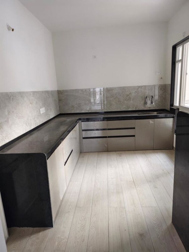 Kitchen, unique-k-shire 3 Bedroom 1127 Sq.Ft. Apartment In Punawale Pune 10050834