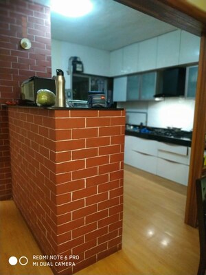 Kitchen in 2 BHK Apartment at Ganesh Residency, Pimple Saudagar – for Rent