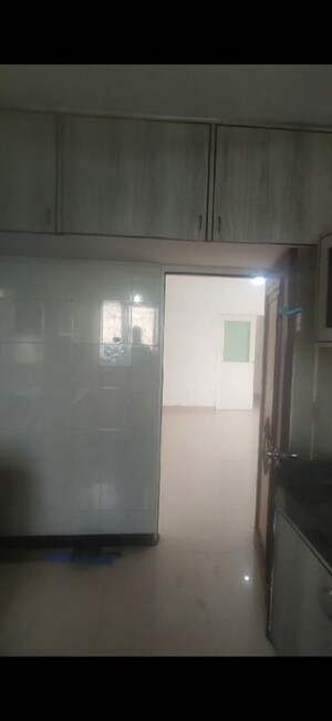 Kitchen in 2 BHK Apartment at Whispering Heights, Malad West – for Sale