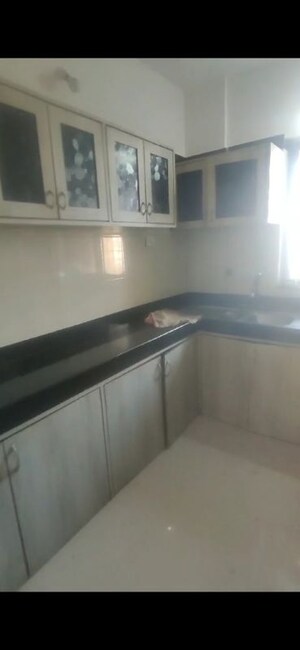 Kitchen in 2 BHK Apartment at Whispering Heights, Malad West – for Sale