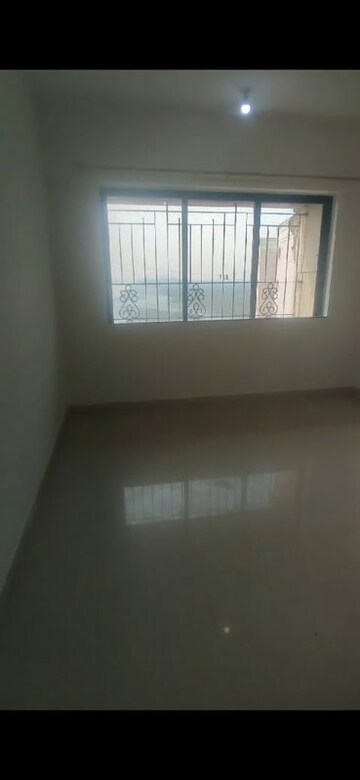 Room in 2 BHK Apartment at Whispering Heights, Malad West – for Sale