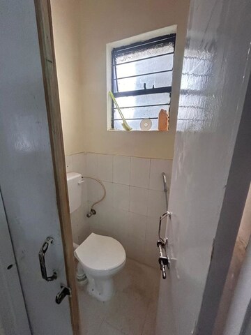Bathroom in 2 BHK Apartment at Wadgaon Sheri – for Sale