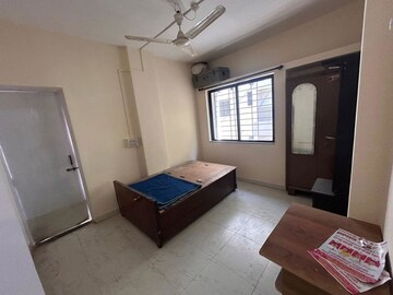 Living Room in 2 BHK Apartment at Wadgaon Sheri – for Sale