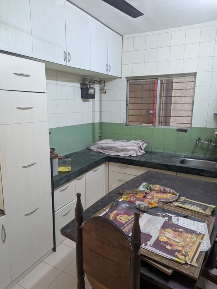 Kitchen, wadgaon sheri 2 Bedroom 890 Sq.Ft. Apartment In Wadgaon Sheri Pune 10051009