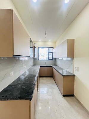 Kitchen in 3 BHK Apartment at Dhakoli – for Sale