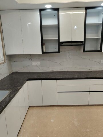 Kitchen in 5 BHK Builder Floor at Nehru Enclave – for Sale