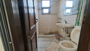 Bathroom in 5 BHK Builder Floor at Kalkaji – for Sale